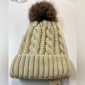 Buy 1 get 1 free Women’s Cream Knit hat with  Pom-Pom. Stretchy fabric lined
NWT